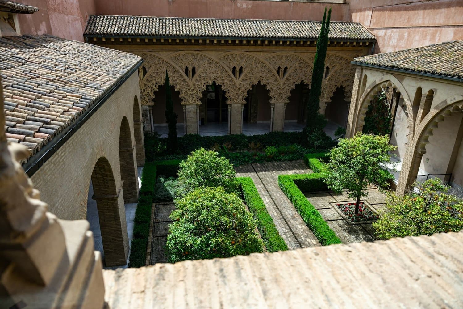 The courtyard seen from the upstairs corridor